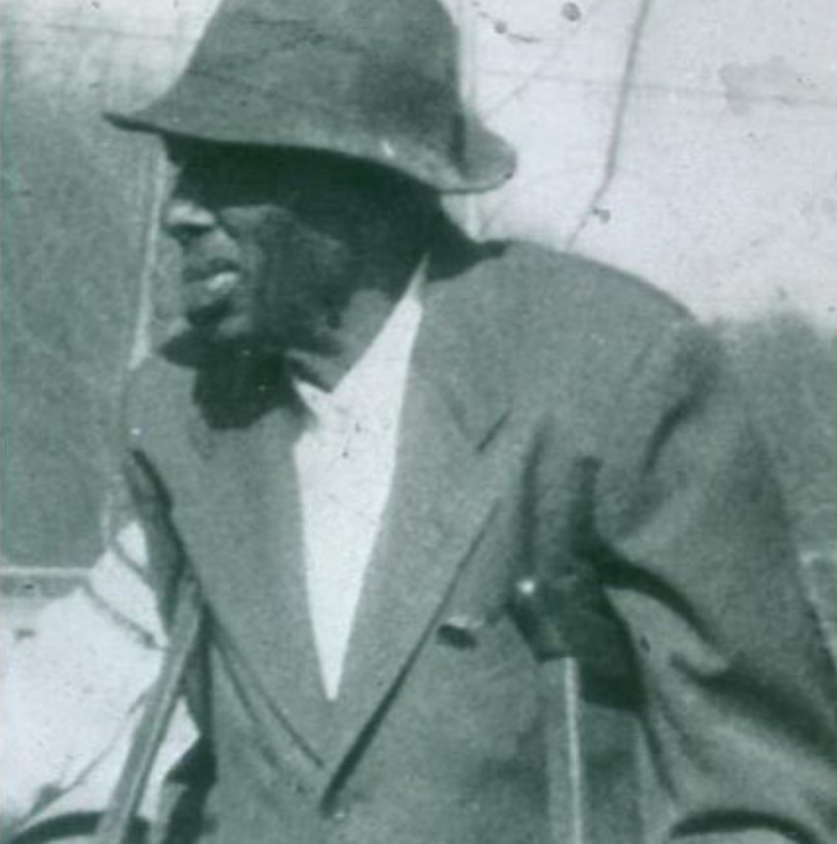 Ancestor in a suit and hat