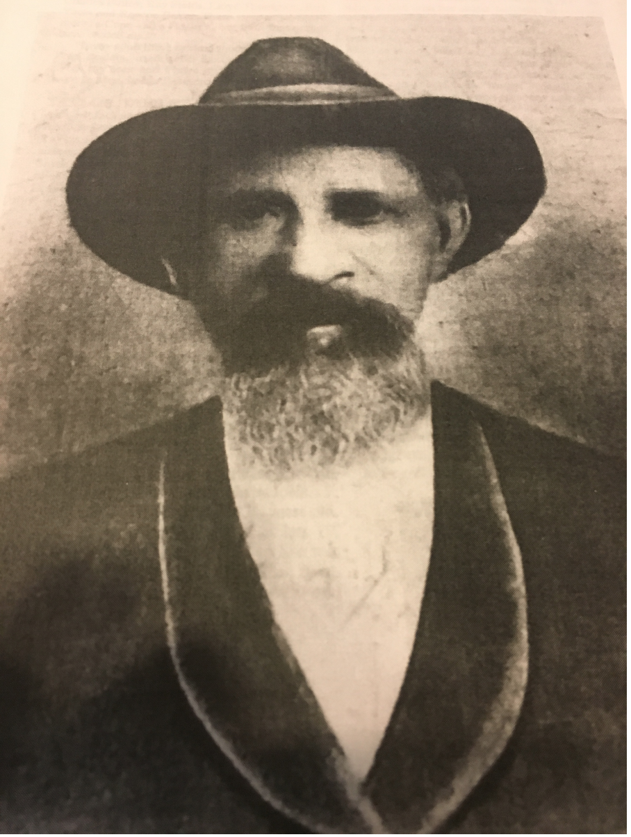 Portrait of a bearded ancestor in a wide-brimmed hat